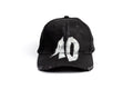 TenProcentr DIX Baseball Cap in Schwarz, Frontansicht mit weißer 10-Stickerei und Used-Look am Schirm